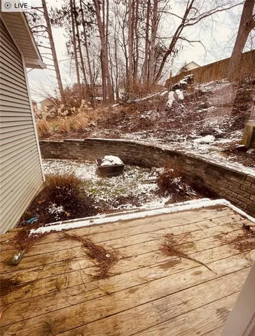 a view of a water fountain in the yard