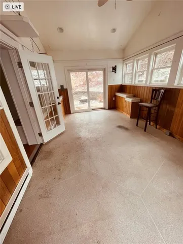 a view of livingroom with furniture and windows