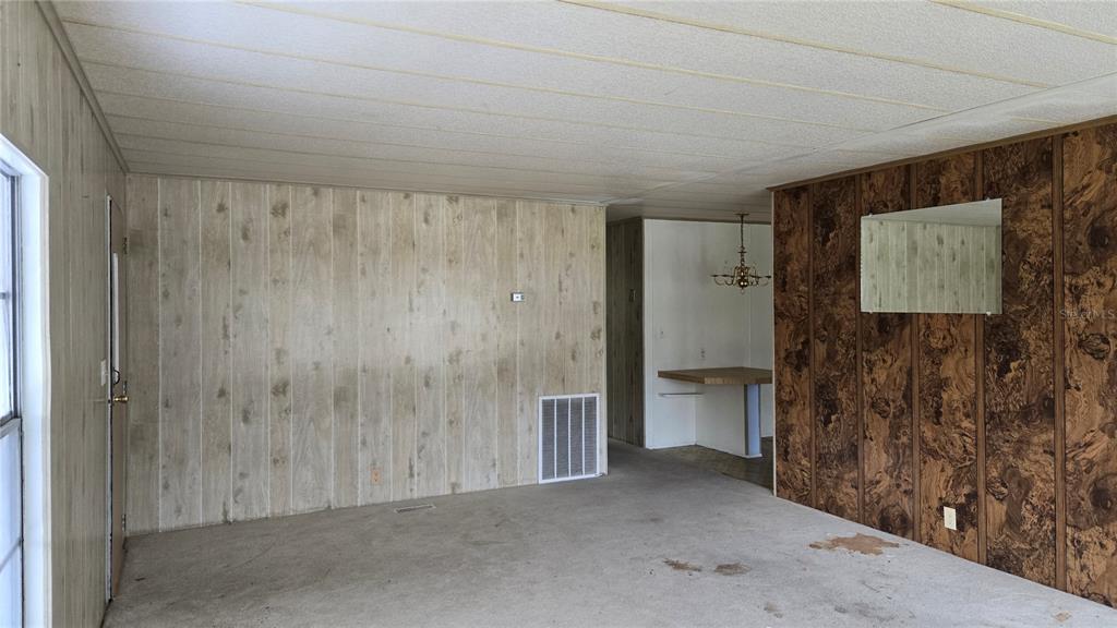 5921 Southwest 63rd Street Ocala, FL 34474 - Photo 12 of 24 a view of a big room with a elevator