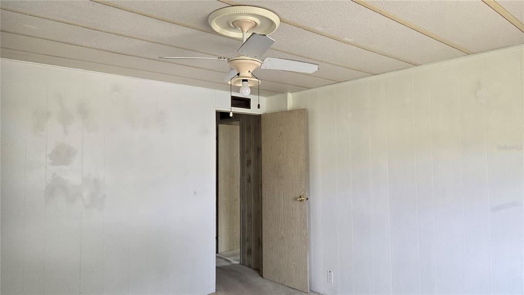5921 Southwest 63rd Street Ocala, FL 34474 - Photo 20 of 24 a bathroom with a shower and a chandelier