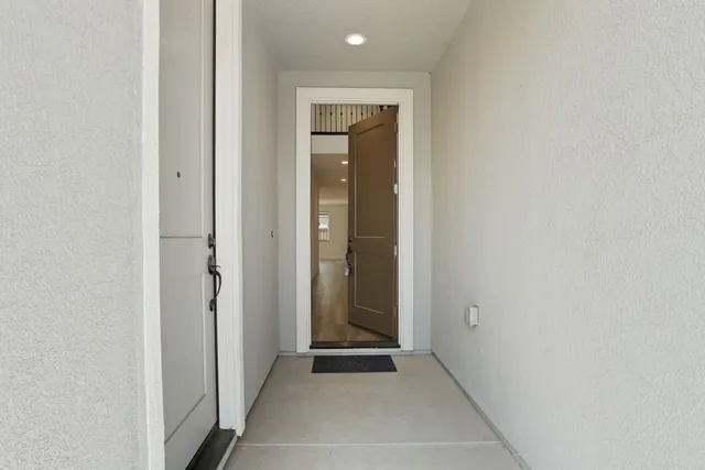 a bathroom with a sink a toilet and vanity