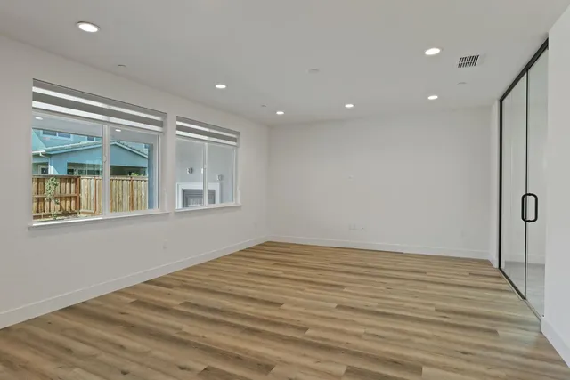 an empty room with windows