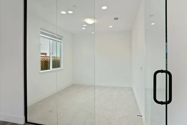 a bathroom with a sink vanity and a mirror