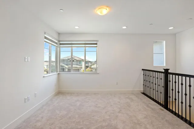 a bathroom with a tub sink a mirror and shower