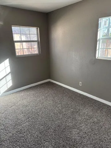 a view of yard covered with snow