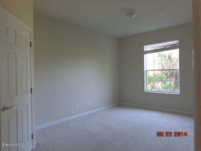 3848 Lexmark Lane, Unit 208 Rockledge, FL 32955 - Photo 12 of 16 Guest Bedroom