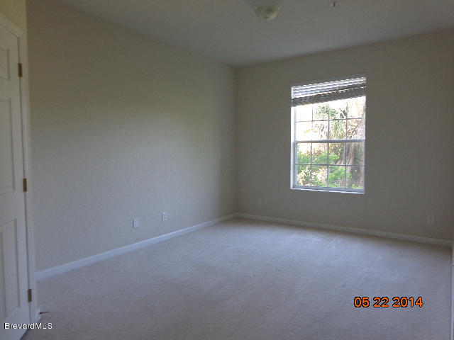 3848 Lexmark Lane, Unit 208 Rockledge, FL 32955 - Photo 7 of 16 Master Bedroom