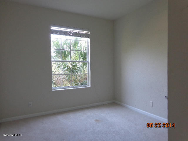 3848 Lexmark Lane, Unit 208 Rockledge, FL 32955 - Photo 10 of 16 Guest Bedroom