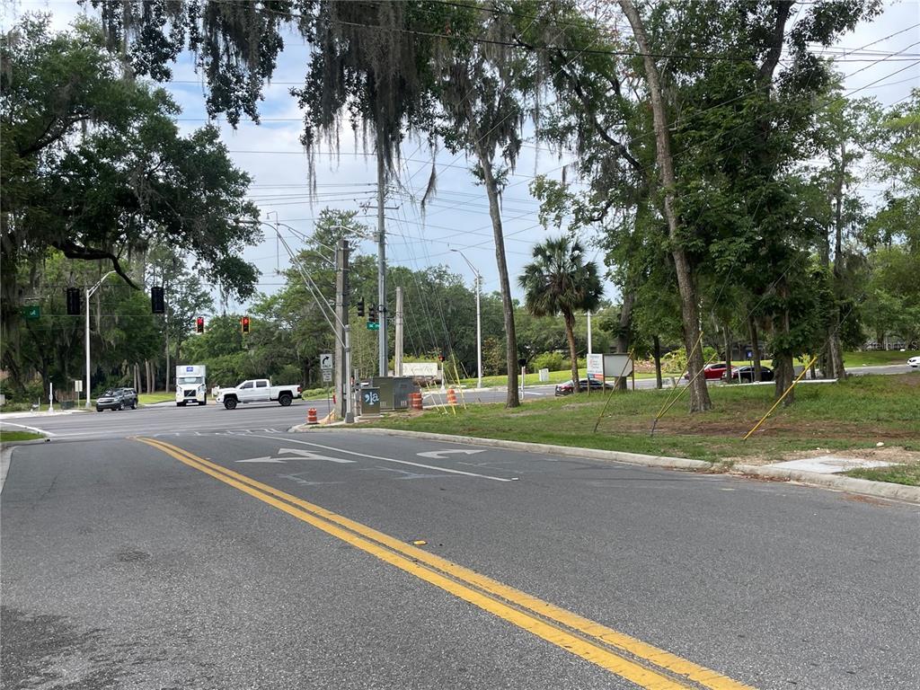 Southeast 17th Street Ocala, FL 34471 - Photo 9 of 19 a view of a house with a big yard and palm trees