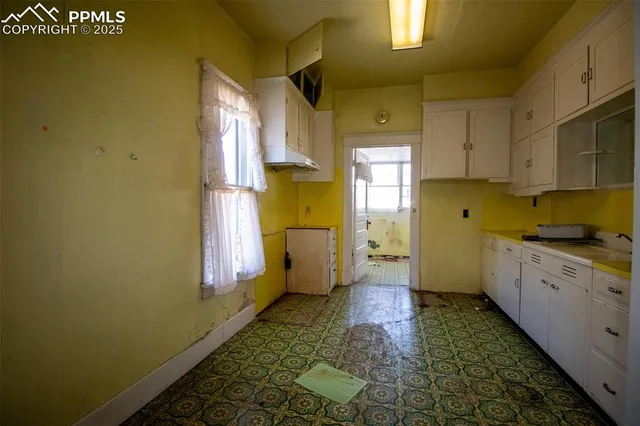 a room with storage and utility