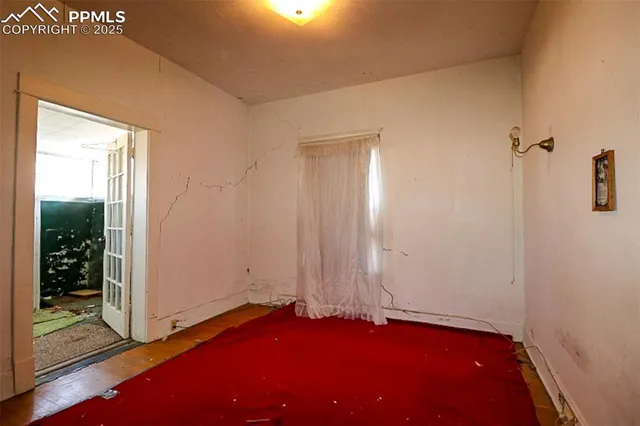 an empty room with windows