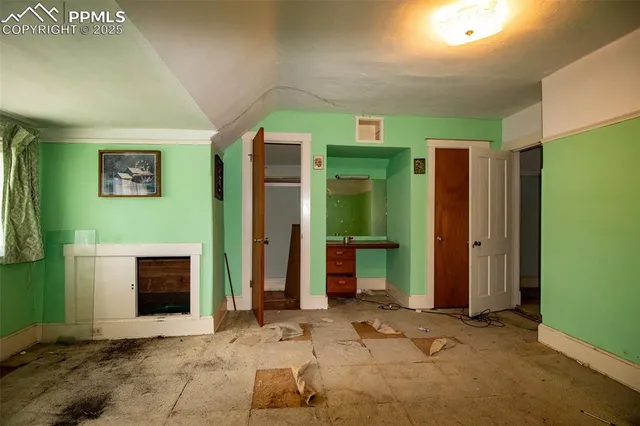 a view of elevator with a hallway