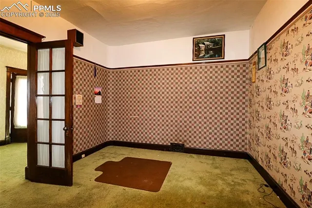 a utility room with cabinets