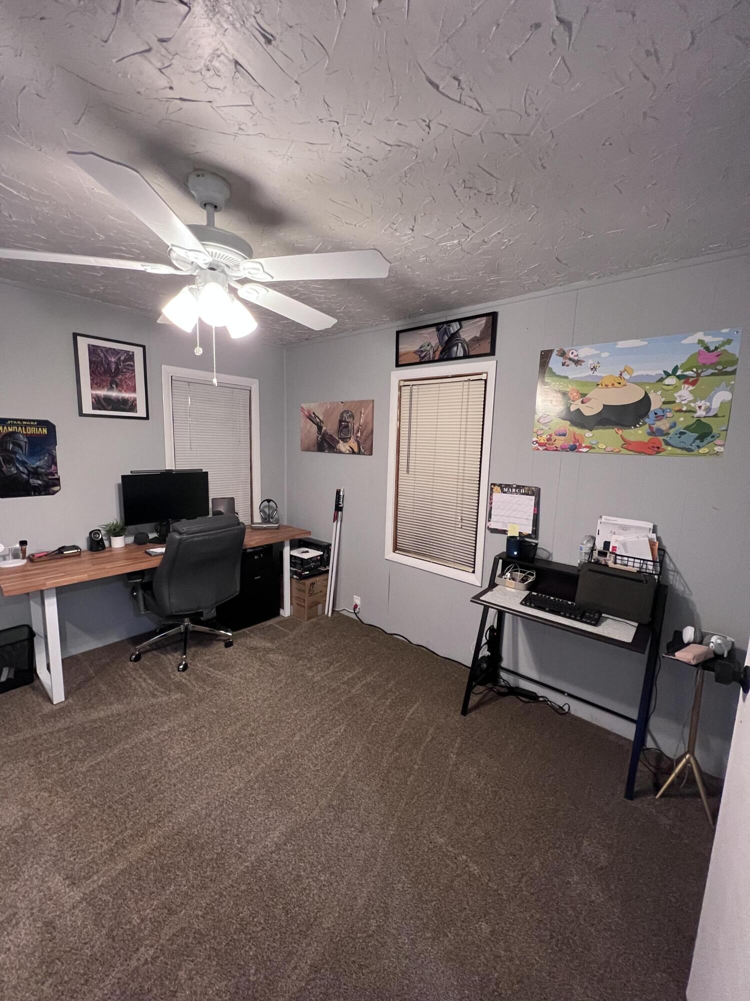 502 Main Street Anton, TX 79313 - Photo 13 of 16 a view of a livingroom with furniture and a flat screen tv