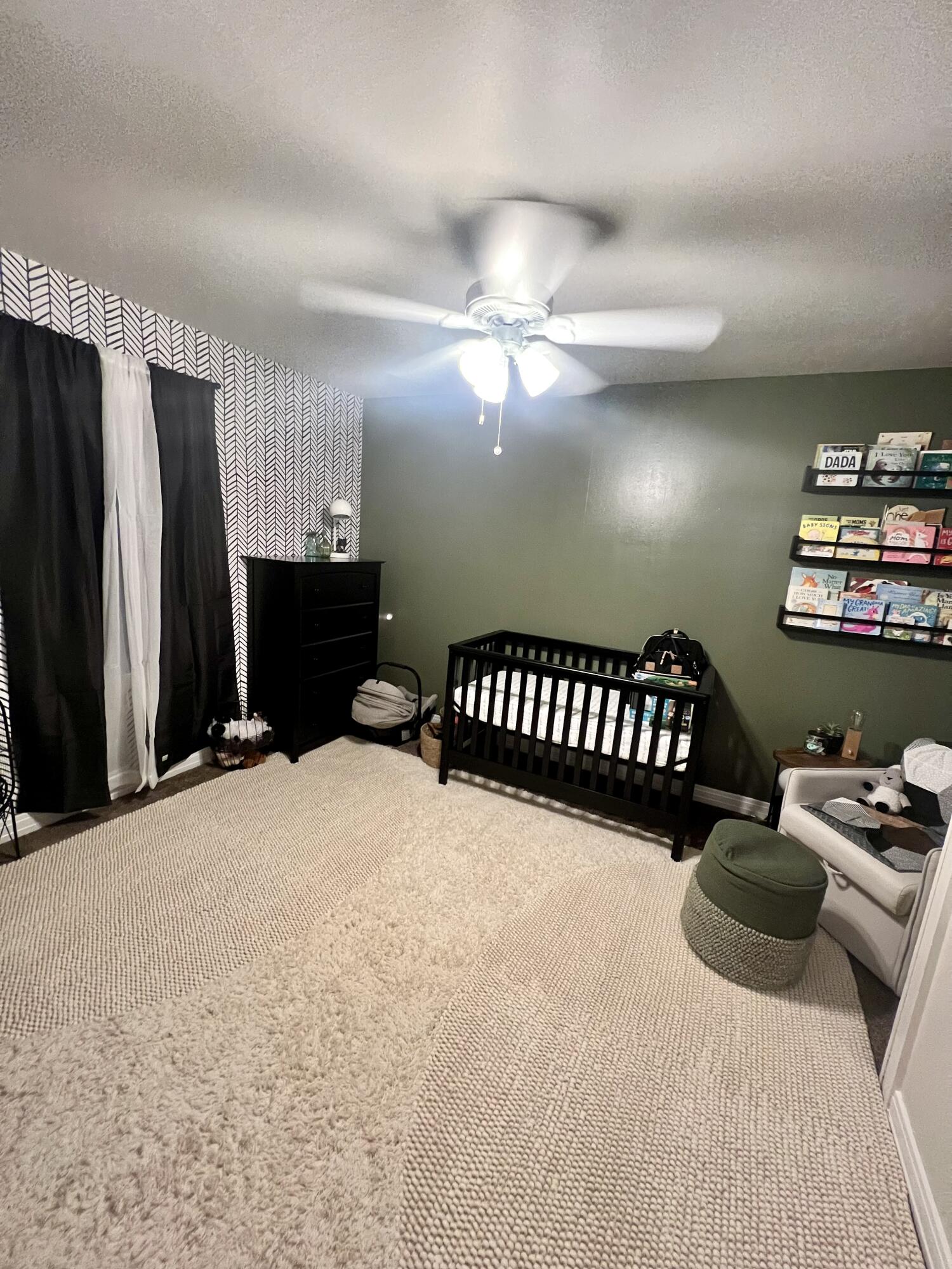 502 Main Street Anton, TX 79313 - Photo 15 of 16 a bedroom with a bed dresser and a window