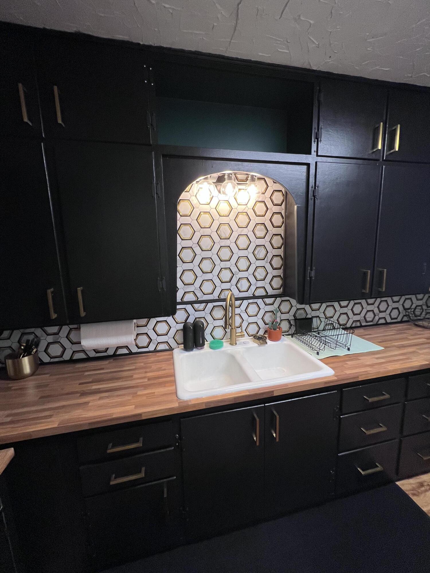 502 Main Street Anton, TX 79313 - Photo 8 of 16 a bathroom with a sink and a mirror