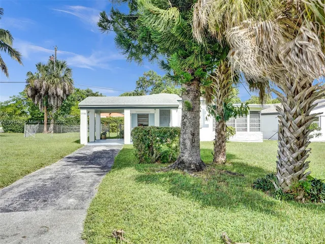a view of a house with garden