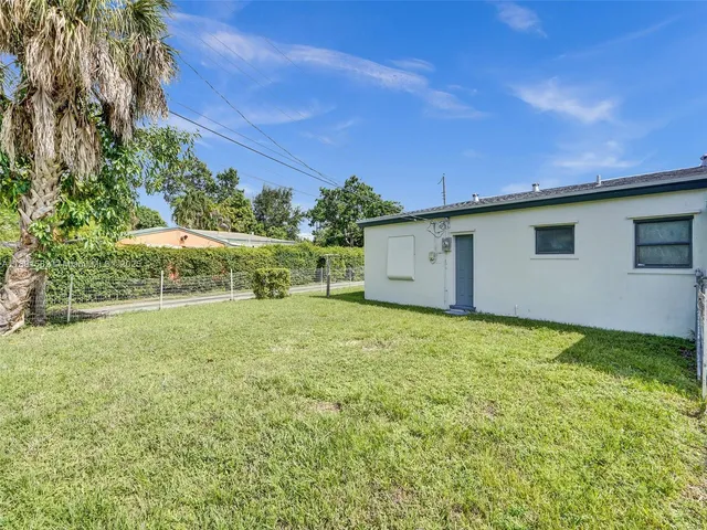a view of outdoor space yard deck patio and swimming pool