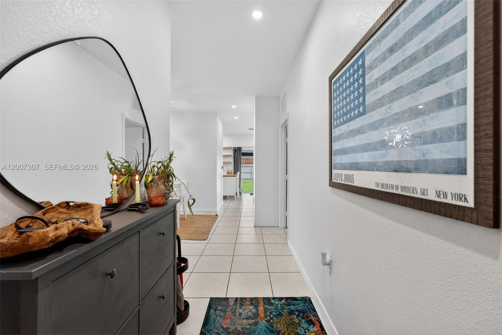 12310 Southwest 216th Street Miami, FL 33170 - Photo 6 of 22 a very nice looking room with a mirror