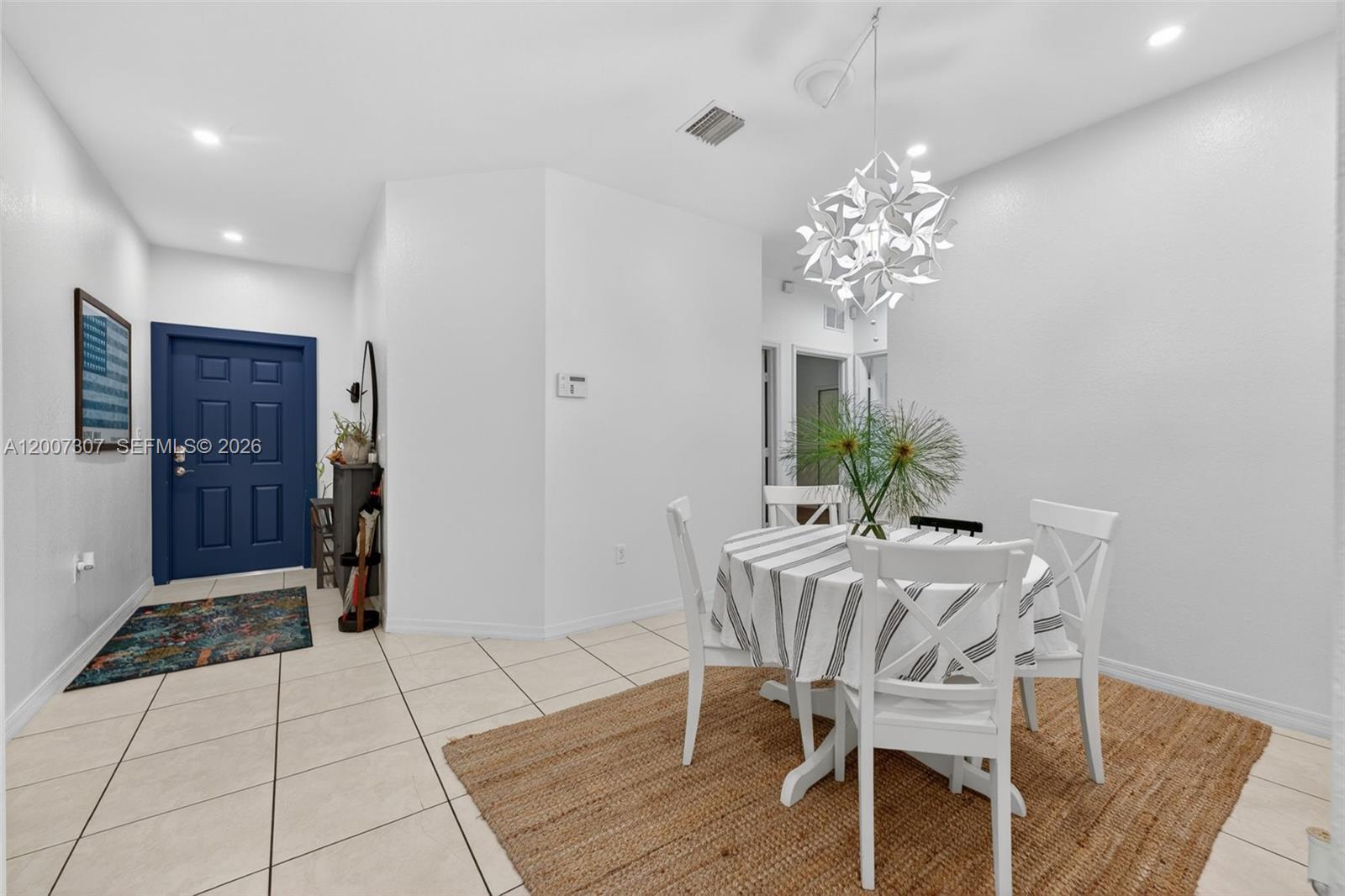 12310 Southwest 216th Street Miami, FL 33170 - Photo 7 of 22 a view of a dining room with furniture and window