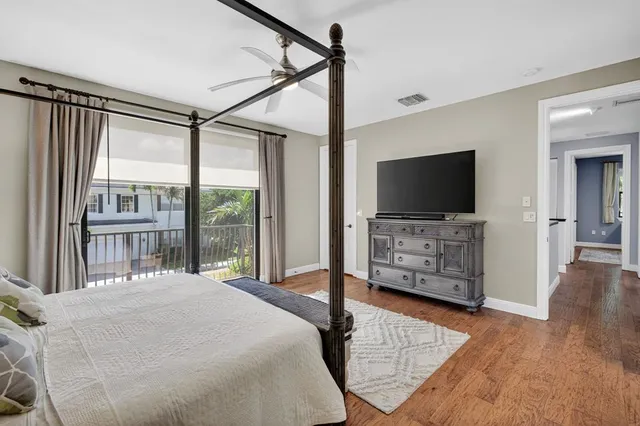 a room with a bed and a window