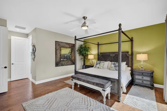 a view of a chair and tables in the balcony
