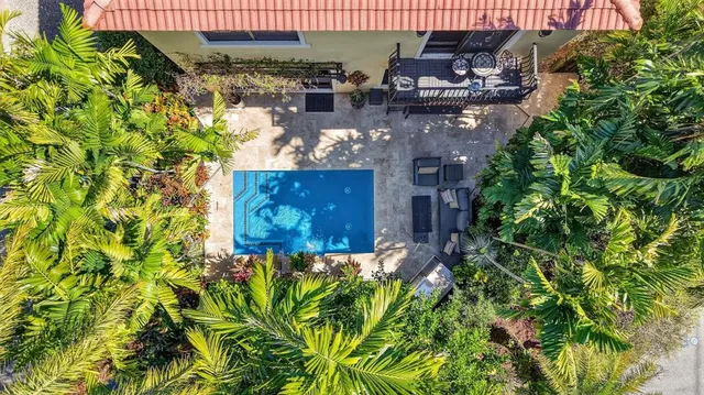 a picture of a book and a white wall