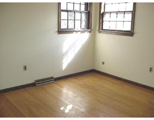 128 Allen Road Billerica, MA 01821 - Photo 12 of 16 an empty room with a window