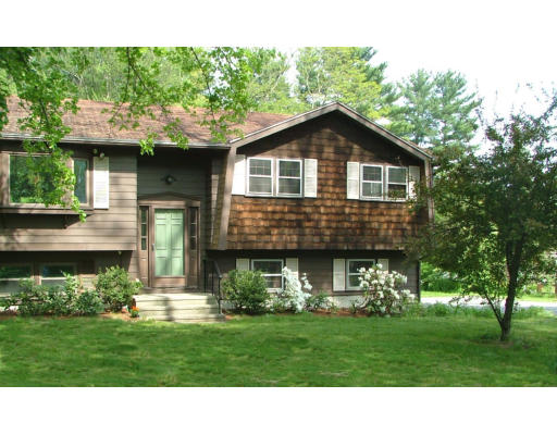128 Allen Road Billerica, MA 01821 - Photo 2 of 16 a front view of a house with a yard