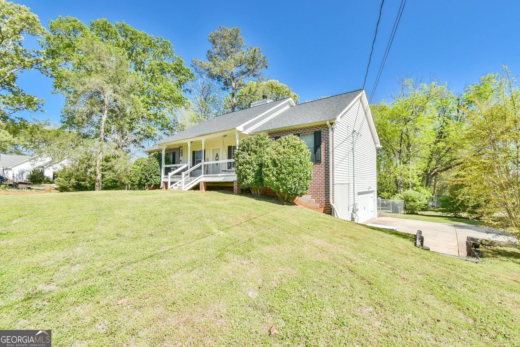 607 Laney Road Locust Grove, GA 30248 - Photo 1 of 1 a view of a house with a yard