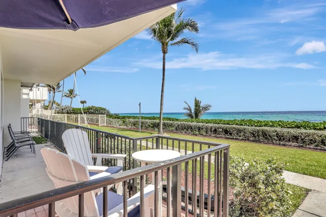 a view of balcony with furniture