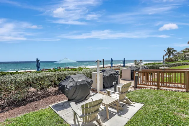 a view of a terrace with furniture