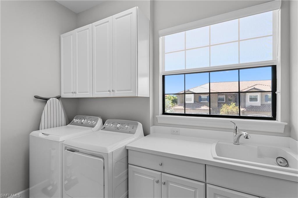 9673 Montelanico Loop, Unit 202 Naples, FL 34119 - Photo 24 of 46 a view of bathroom with a sink and a bathtub