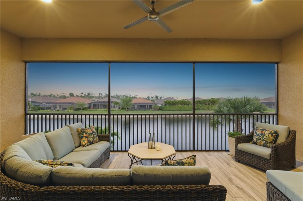 9673 Montelanico Loop, Unit 202 Naples, FL 34119 - Photo 30 of 46 a balcony with furniture