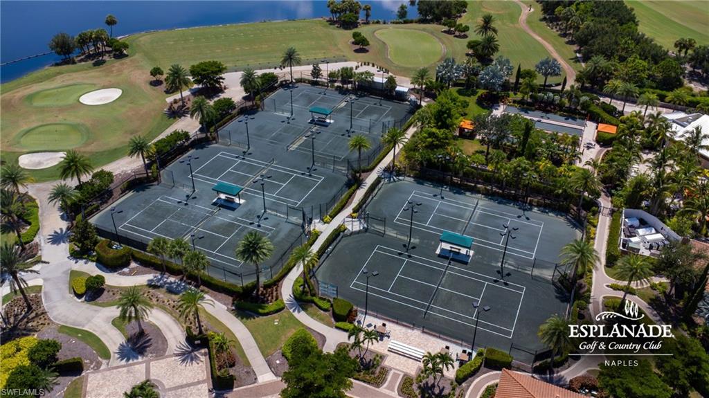 9673 Montelanico Loop, Unit 202 Naples, FL 34119 - Photo 43 of 46 an aerial view of residential houses with outdoor space