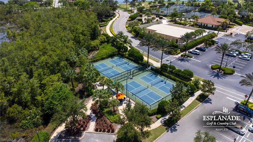 9673 Montelanico Loop, Unit 202 Naples, FL 34119 - Photo 45 of 46 an aerial view of residential houses with outdoor space