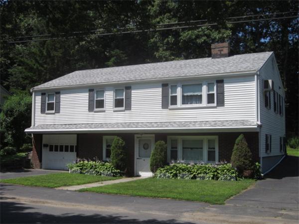 10 Pillings Road Saugus, MA 01906 - Photo 1 of 13 a front view of a house with garden