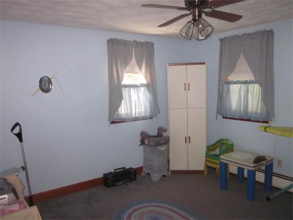10 Pillings Road Saugus, MA 01906 - Photo 12 of 13 a living room with furniture and a window