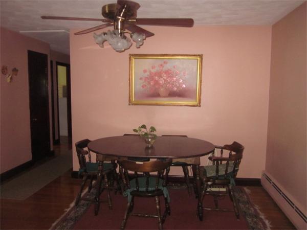 10 Pillings Road Saugus, MA 01906 - Photo 4 of 13 a view of a dining room with furniture and wooden floor