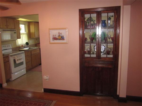 10 Pillings Road Saugus, MA 01906 - Photo 5 of 13 a view of a kitchen from the hallway