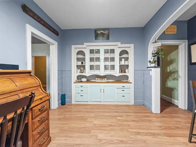 a bedroom with a bed and a closet