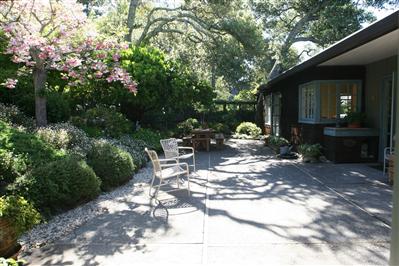 11 Crest Road Ross, CA 94960 - Photo 10 of 11 a patio with table and chairs and potted plants