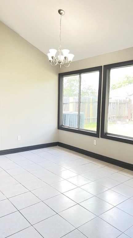 5606 Lyden Ridge Drive Houston, TX 77053 - Photo 17 of 34 a view of an empty room with a window
