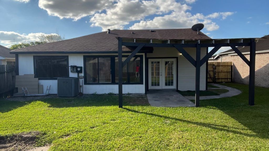 5606 Lyden Ridge Drive Houston, TX 77053 - Photo 18 of 34 a view of a house with backyard and porch