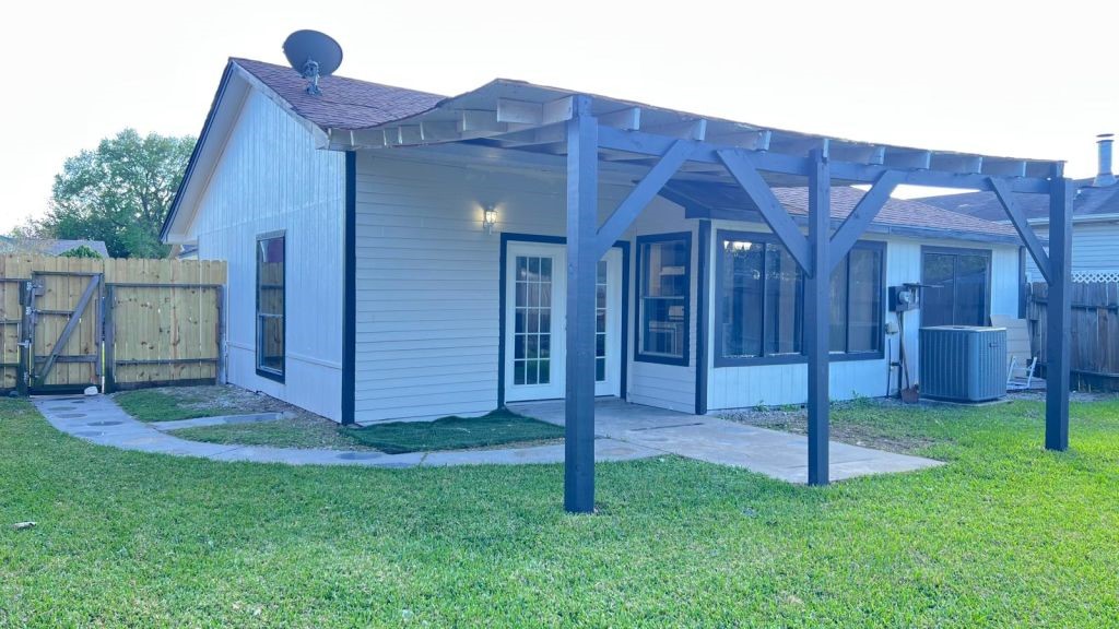 5606 Lyden Ridge Drive Houston, TX 77053 - Photo 27 of 34 a view of a house with a yard