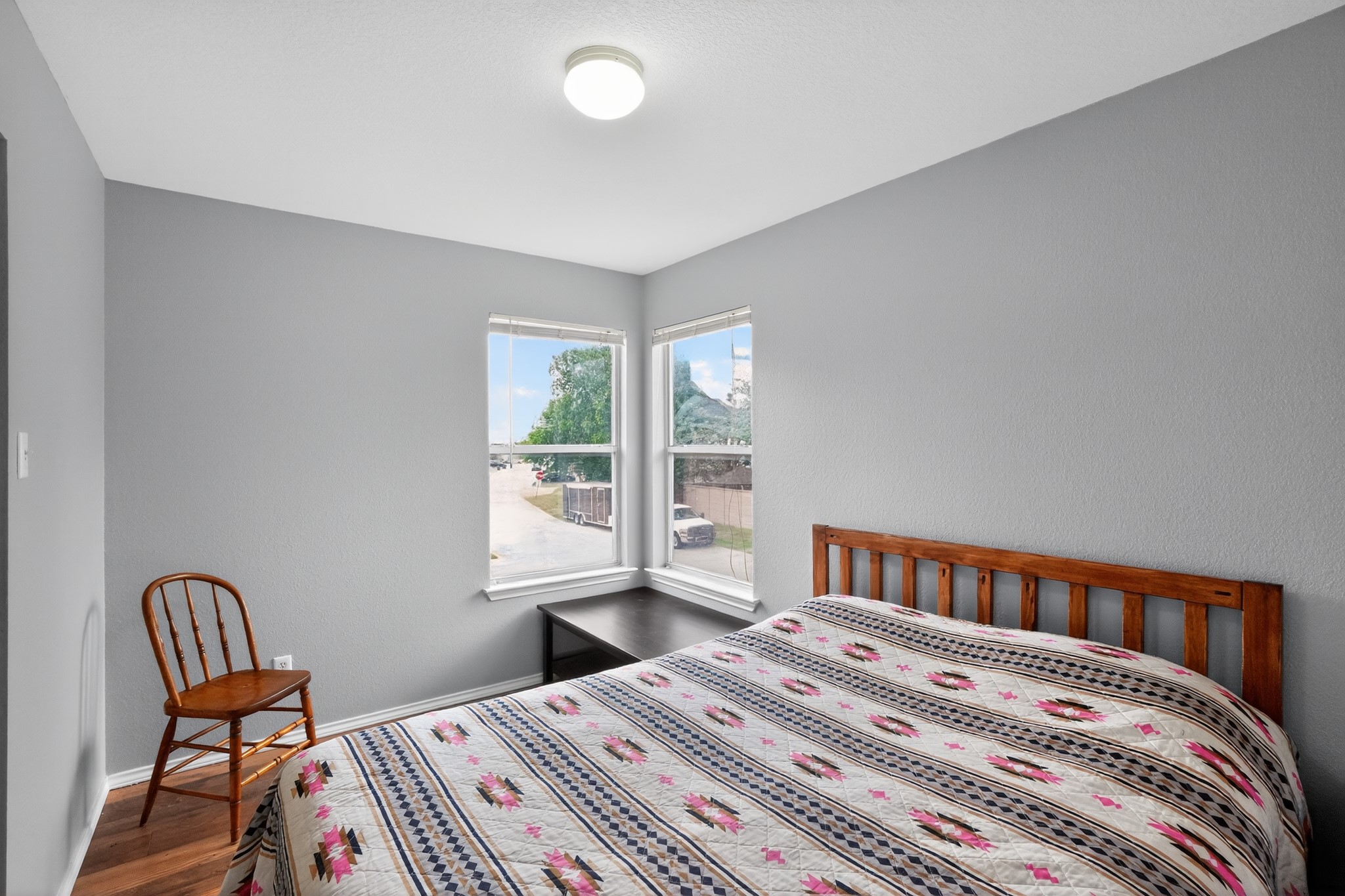 13808 Harris Ridge Boulevard Pflugerville, TX 78660 - Photo 20 of 40 a bedroom with a bed and a window