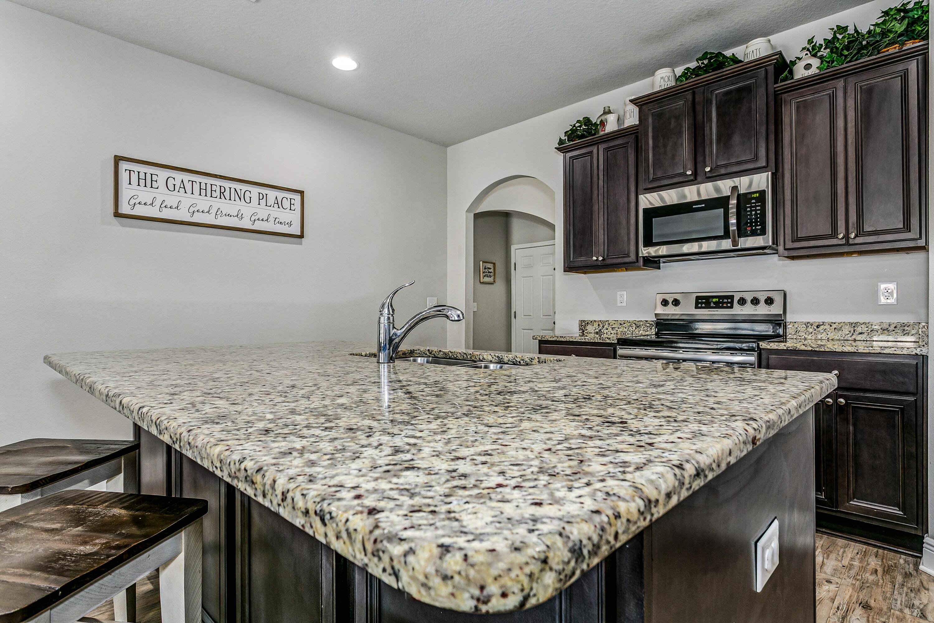 438 Chickadee Street Crestview, FL 32539 - Photo 7 of 40 Rich Espresso Cabinetry!