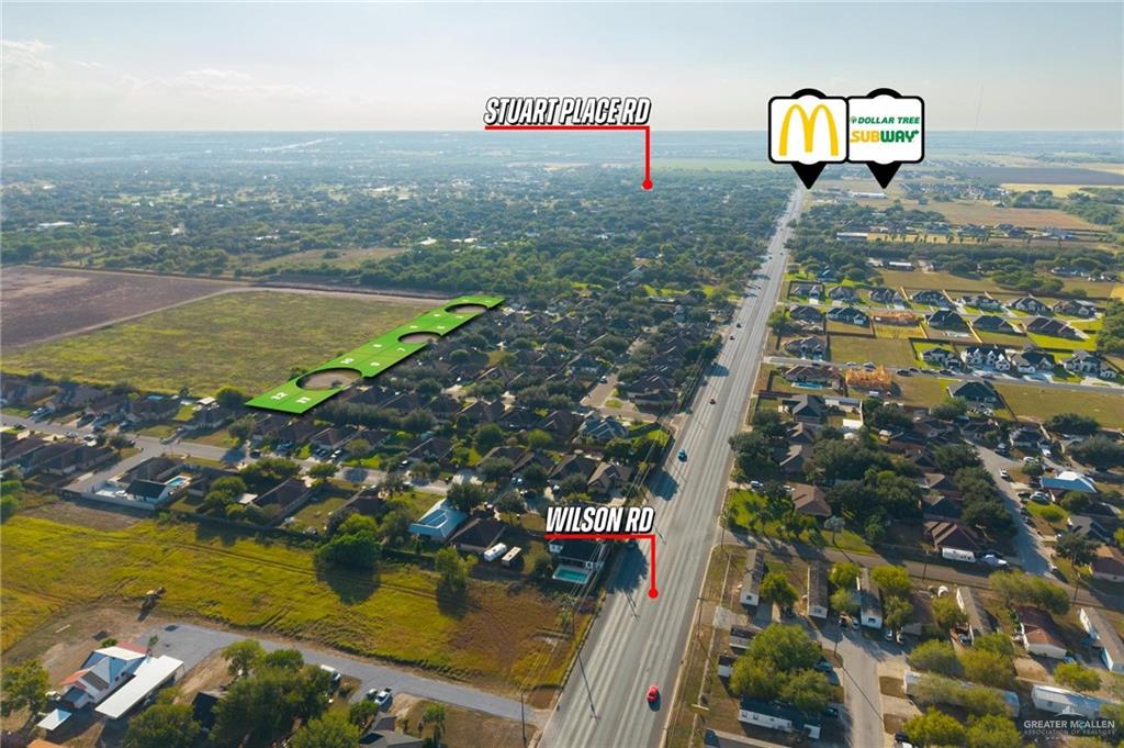 0 Stonebriar Road Harlingen, TX 78552 - Photo 5 of 6 an aerial view of a house with a lake view