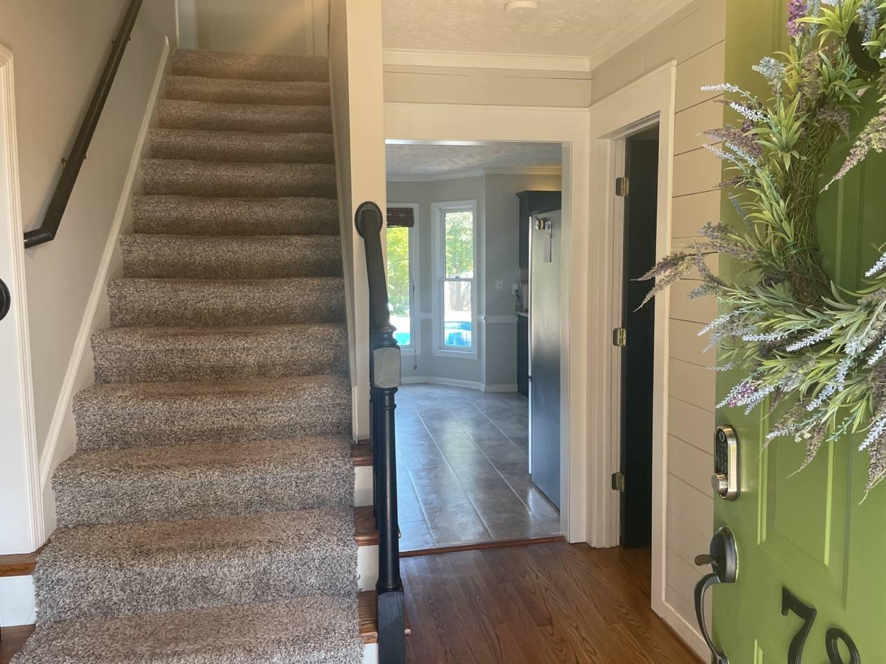 7818 Shuttle Road Fayetteville, NC 28311 - Photo 2 of 21 a view of an entryway with wooden floor and windows