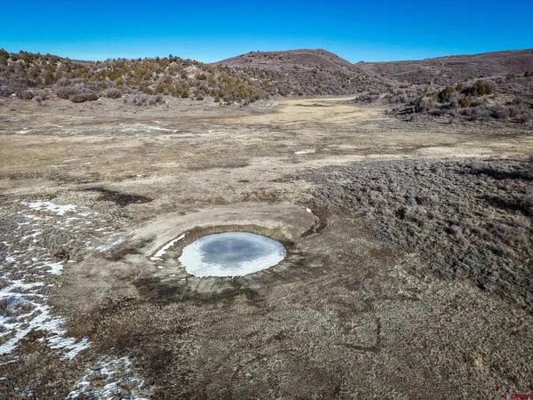 a view of lake with mountain